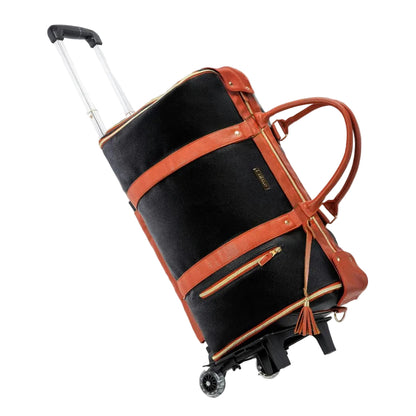 Black suitcase with brown leather straps on a white background